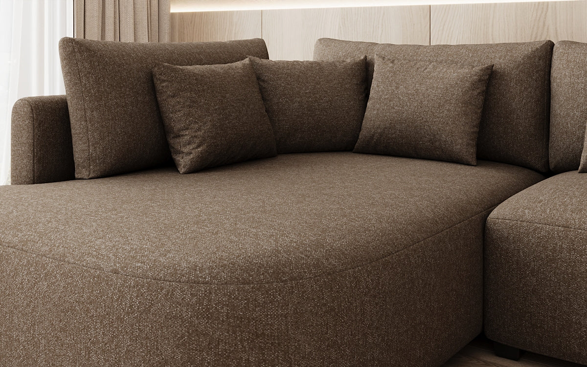 Designer hoekbank Ando met brede ottomane in structuurstof