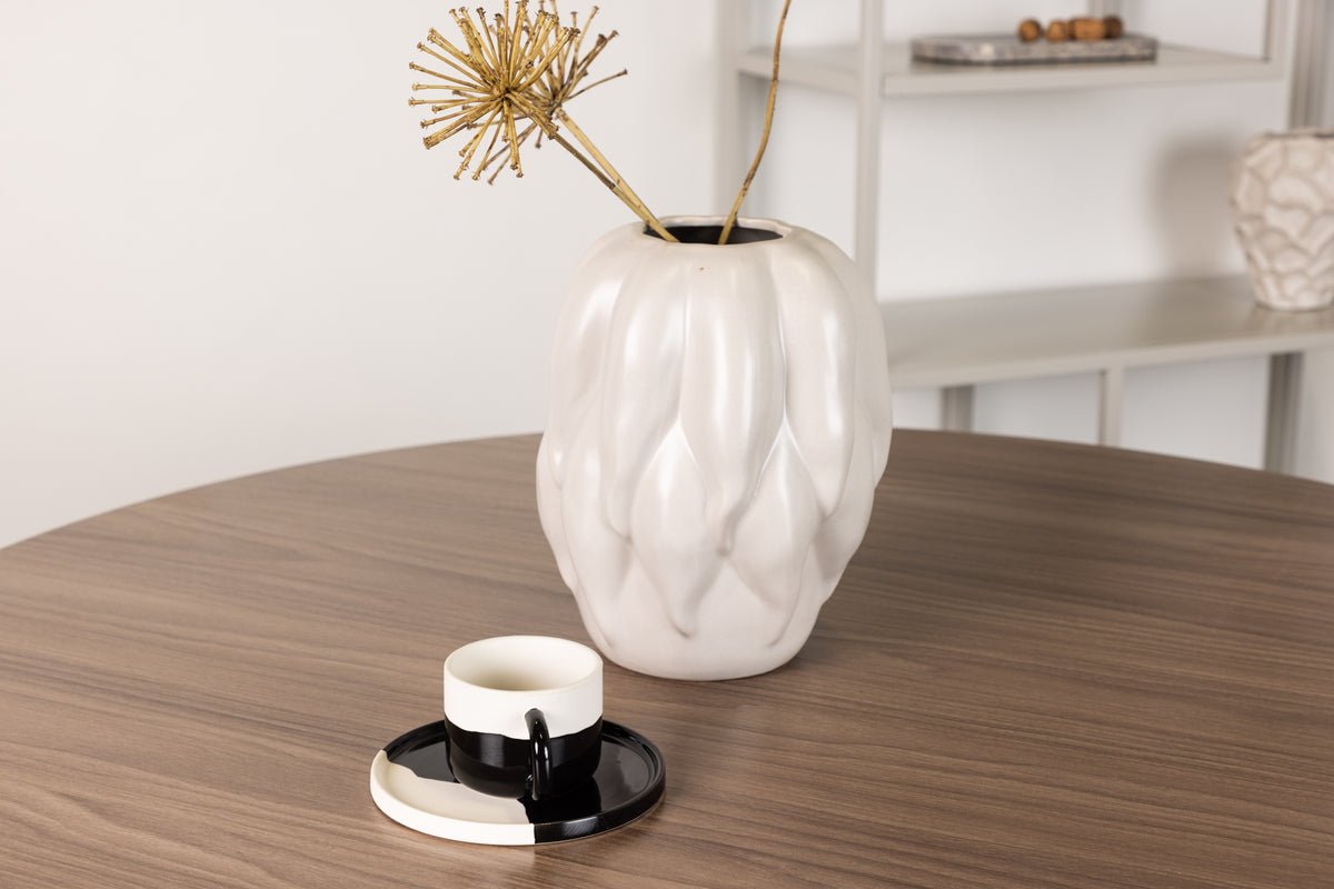 Eettafel Marani - ronde vormen ontmoeten tijdloze elegantie