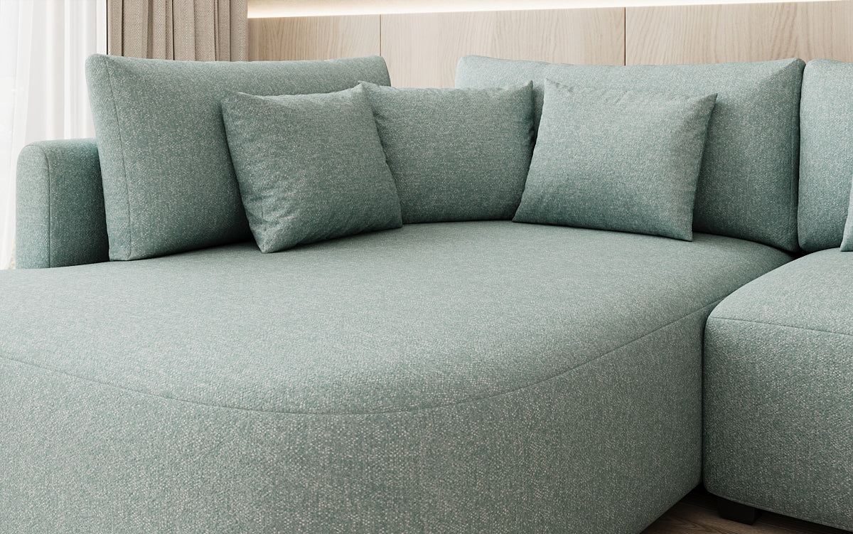 Designer hoekbank Ando met brede ottomane in structuurstof