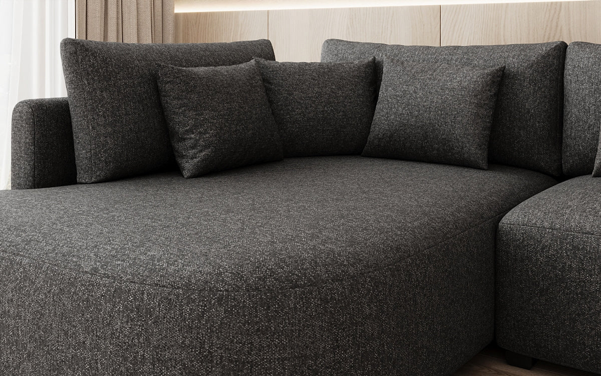 Designer hoekbank Ando met brede ottomane in structuurstof