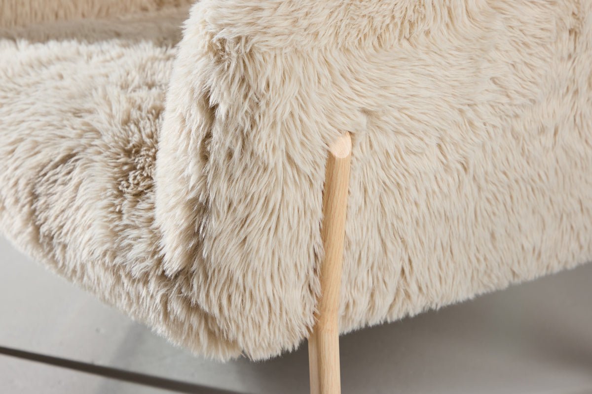 Fauteuil Zara - met poten in houtlook en kunstbont bekleding