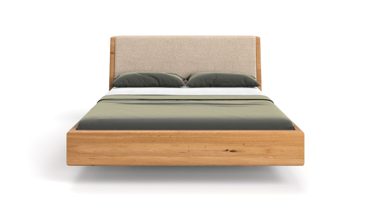 Designer houten bed Cassian van massief eiken in zwevende look