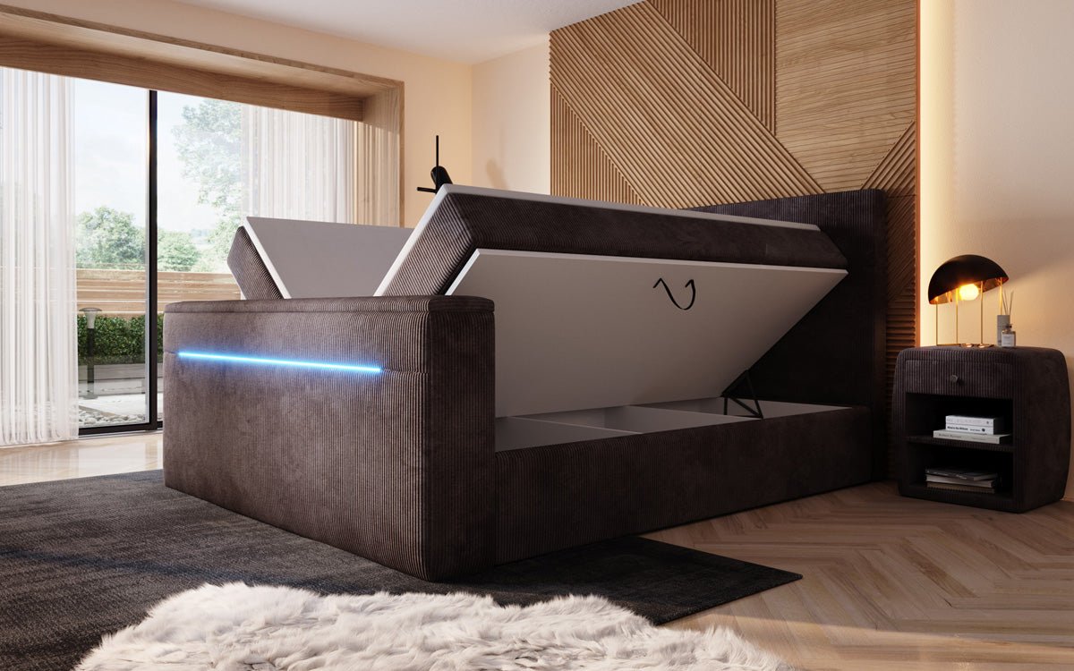 Boxspringbed Sejour met TV-lift, RGB en opbergruimte in Ribstof