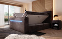 Boxspringbed Sejour met TV-lift, RGB en opbergruimte in Ribstof