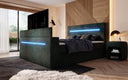 Boxspringbed Sejour met TV-lift, RGB en opbergruimte in Ribstof