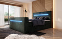 Boxspringbed Sejour met TV-lift, RGB en opbergruimte in Ribstof