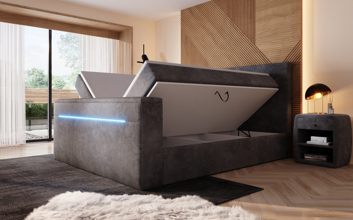 Boxspringbed Sejour met TV-lift, RGB en opbergruimte in Ribstof