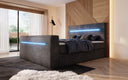 Boxspringbed Sejour met TV-lift, RGB en opbergruimte in Ribstof
