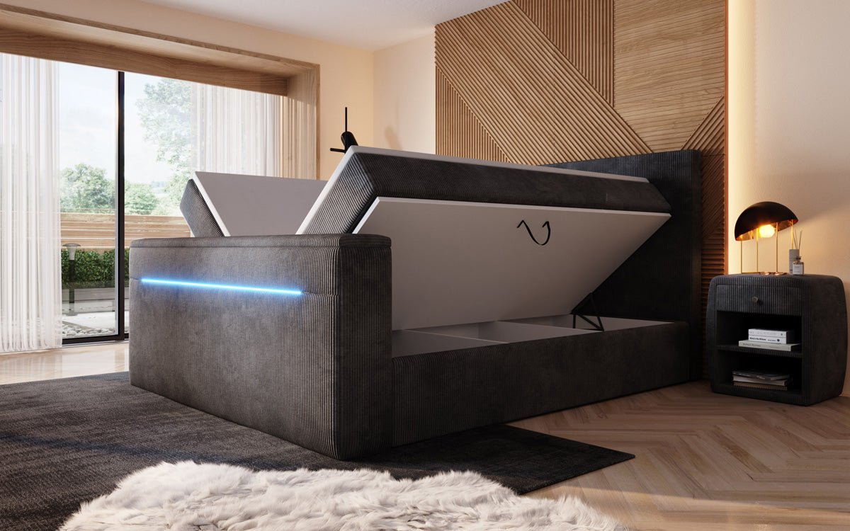Boxspringbed Sejour met TV-lift, RGB en opbergruimte in Ribstof