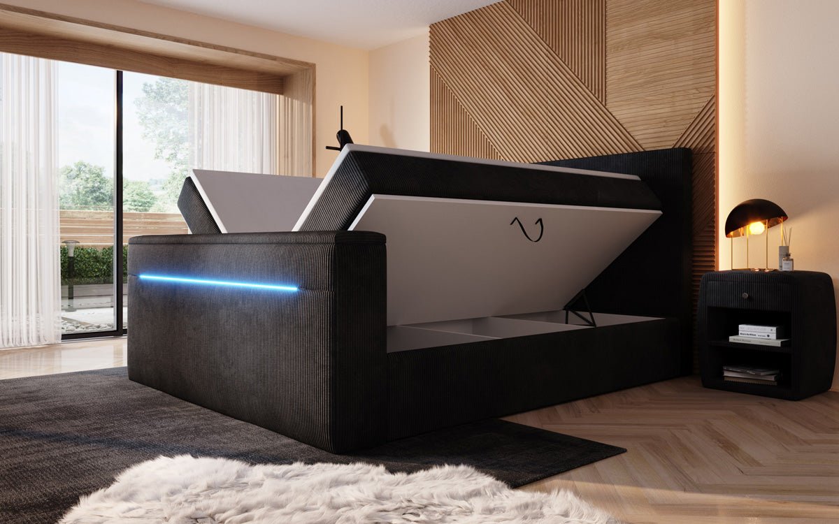 Boxspringbed Sejour met TV-lift, RGB en opbergruimte in Ribstof