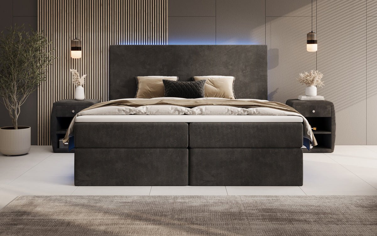 Boxspringbed Voyage met LED en opbergruimte in Ribstof