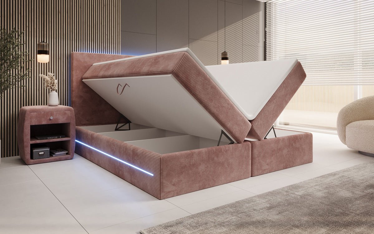 Boxspringbed Voyage met LED en opbergruimte in Ribstof