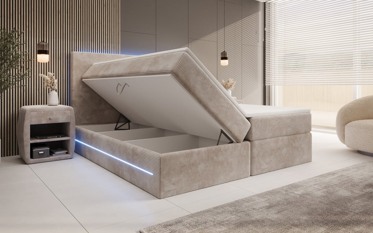 Boxspringbed Voyage met LED en opbergruimte in Ribstof