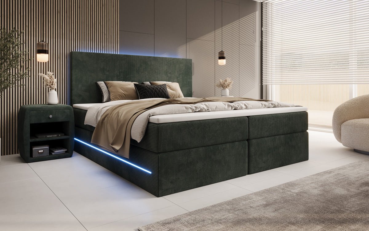Boxspringbed Voyage met LED en opbergruimte in Ribstof