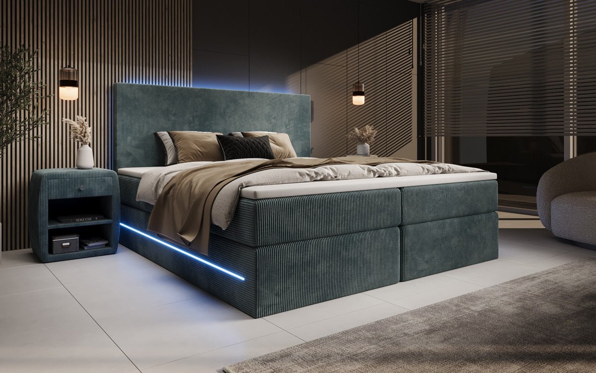 Boxspringbed Voyage met LED en opbergruimte in Ribstof