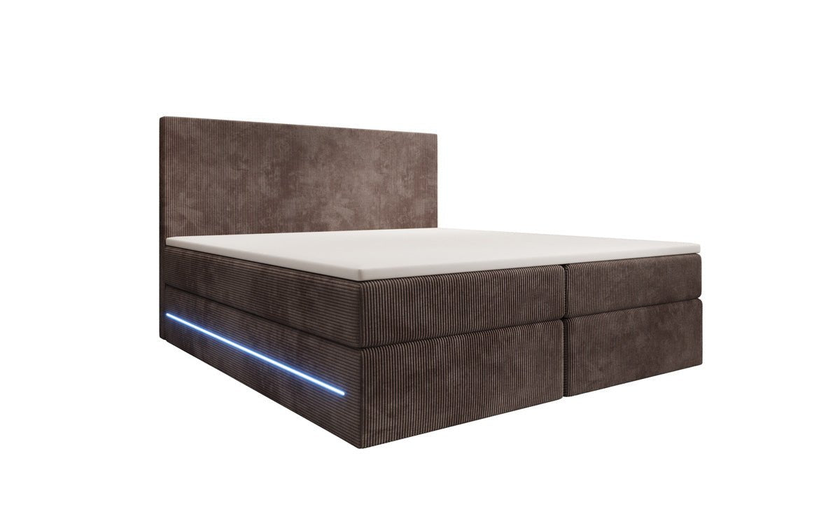 Boxspringbed Voyage met LED en opbergruimte in Ribstof