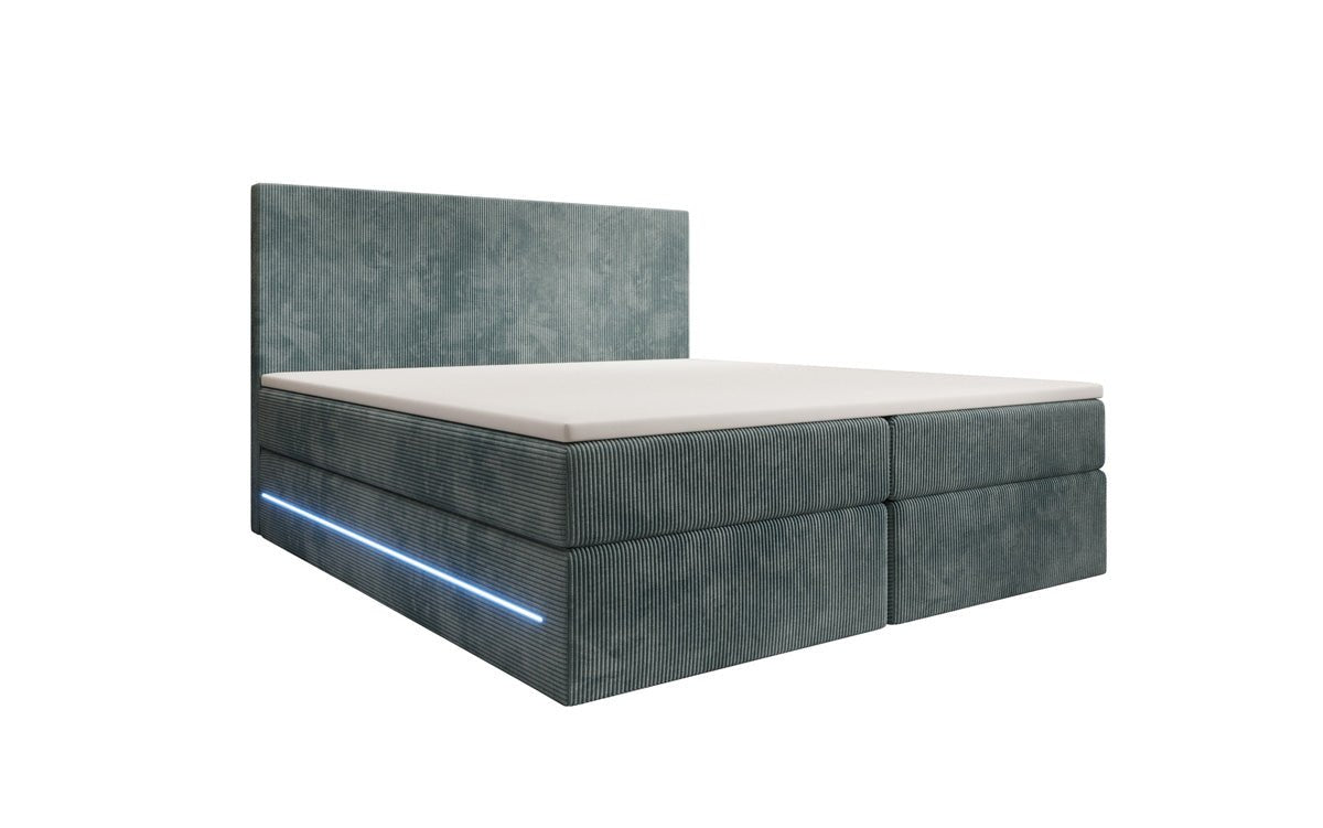Boxspringbed Voyage met LED en opbergruimte in Ribstof