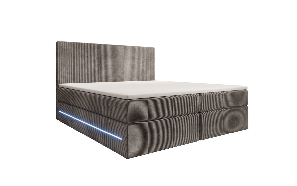 Boxspringbed Voyage met LED en opbergruimte in Ribstof