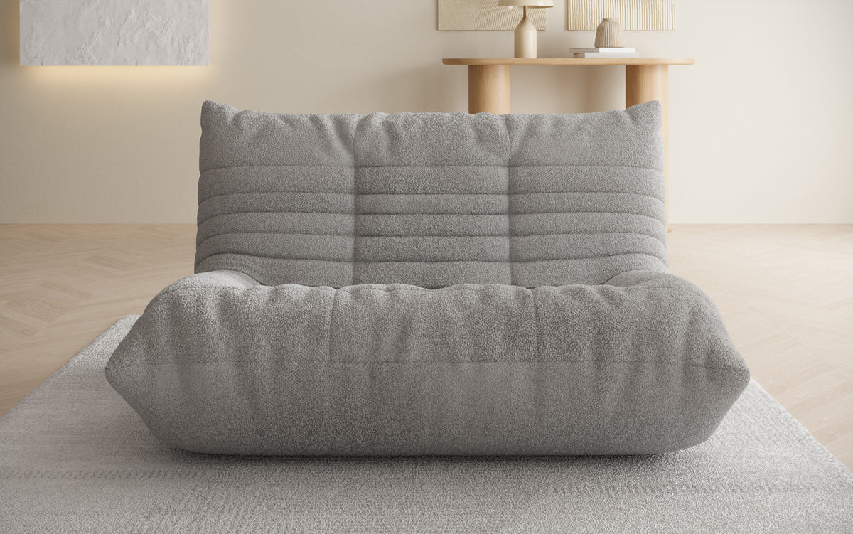 Designer 2-zits bank Calmo in Teddystof Bouclé