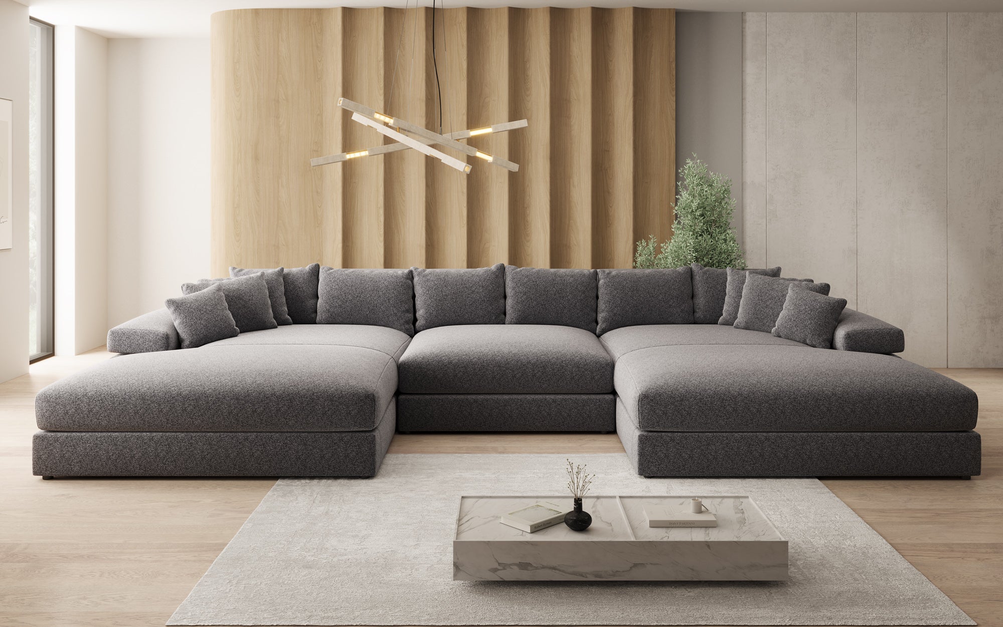 Designsofa Bernardo U met brede ottomane in structuurstof