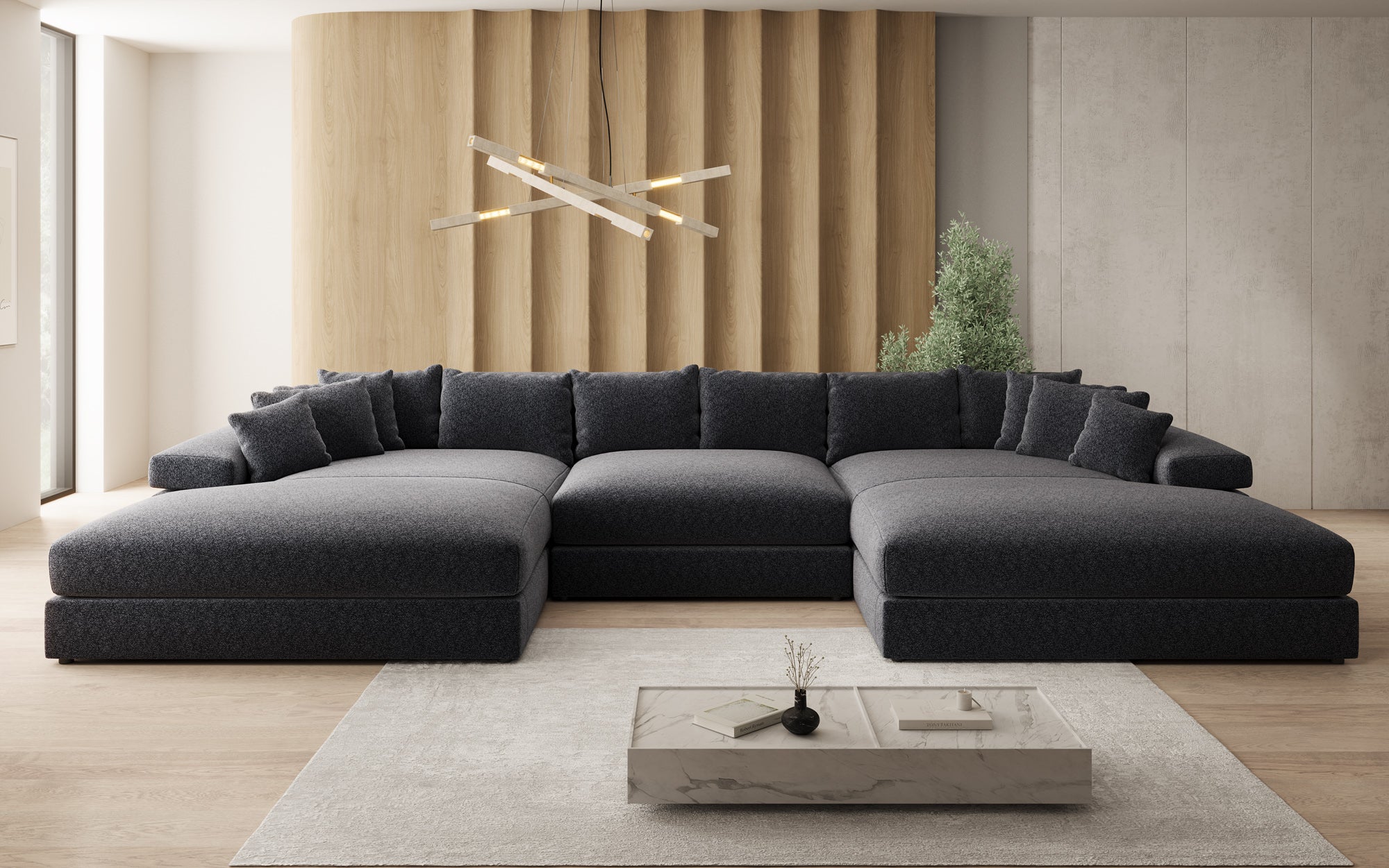 Designsofa Bernardo U met brede ottomane in structuurstof