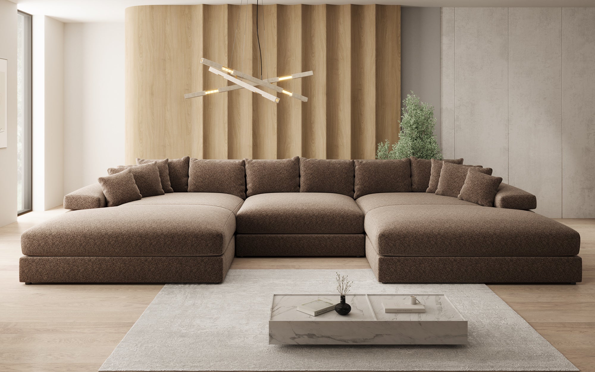 Designsofa Bernardo U met brede ottomane in structuurstof
