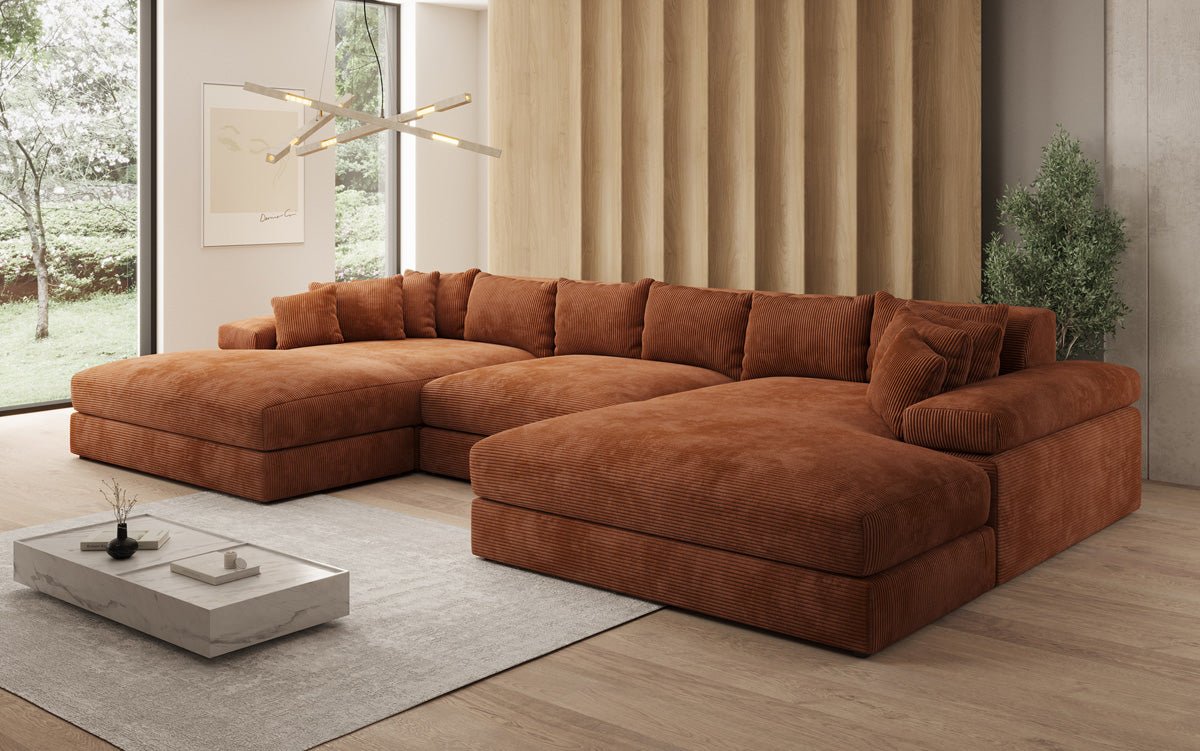 Designersofa Bernardo U met brede ottomane in ribstof