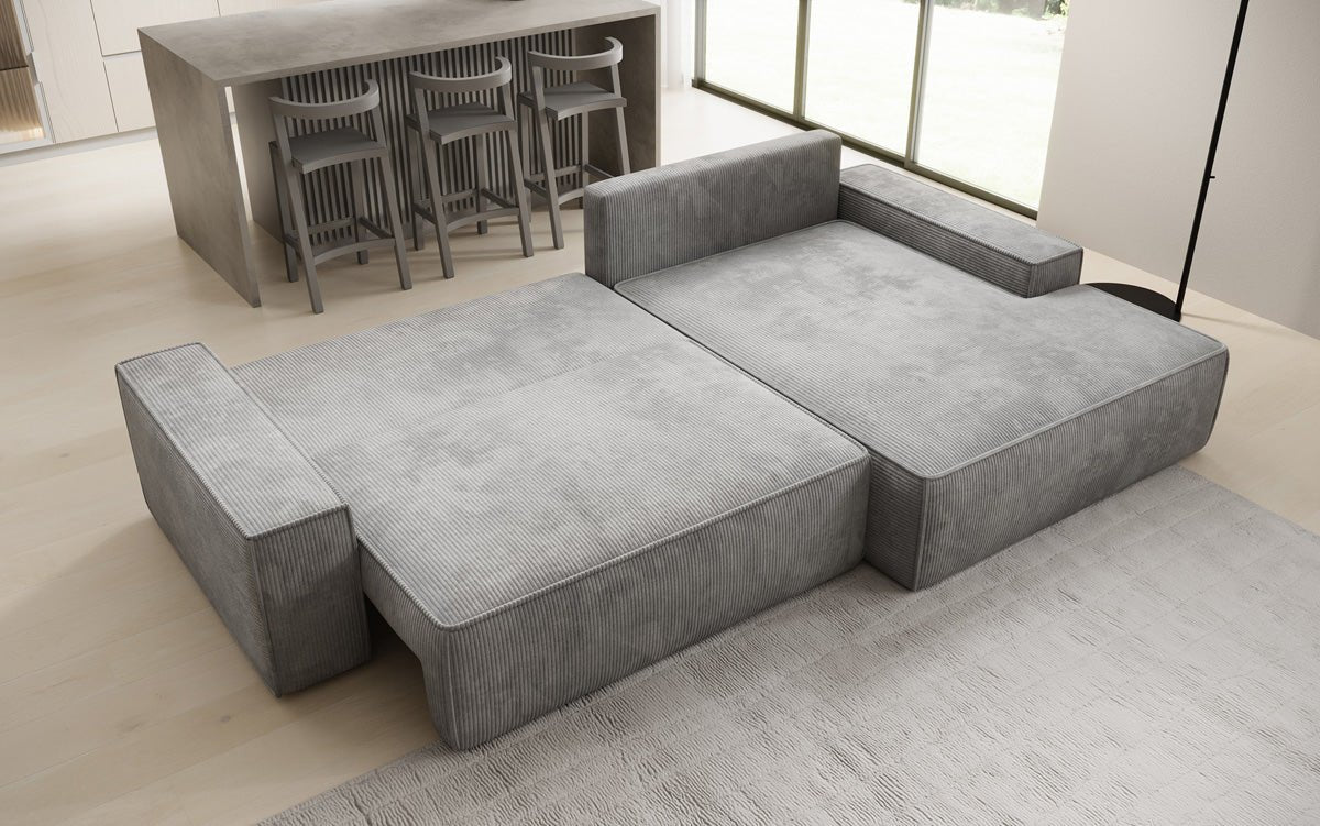 Designbank Verona met brede ottomane met slaap- en uitklapfunctie in Ribstof