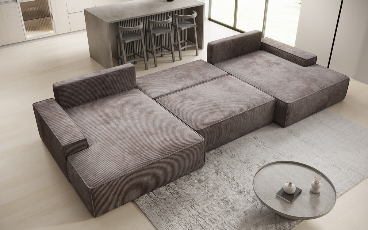Designsofa Verona U met brede ottomane, slaapfunctie en opbergruimte in Ribstof