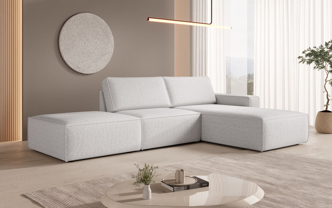 Modulares Ecksofa Yuma mit Beistellhocker aus Bouclé