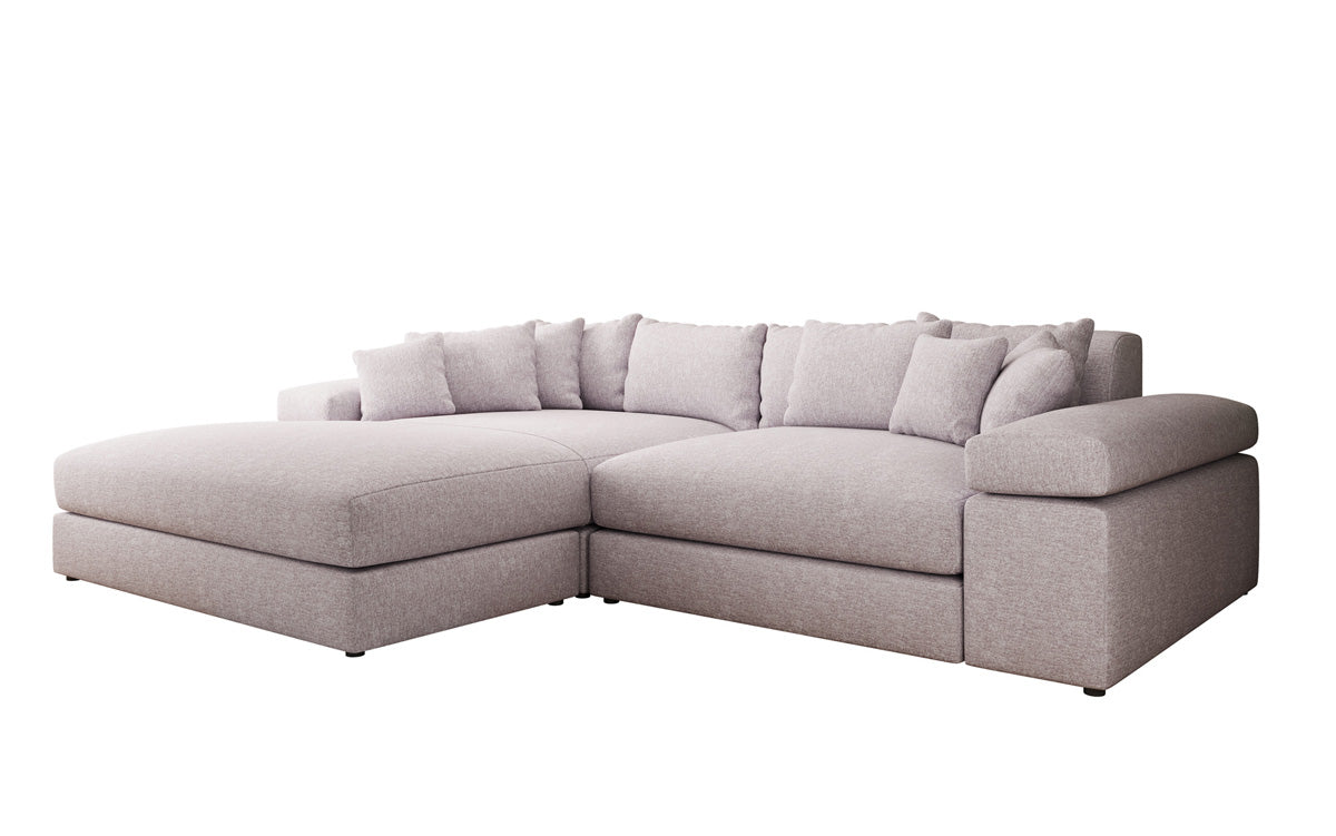 Designer-hoekbank Bernardo met brede ottomane in structuurstof
