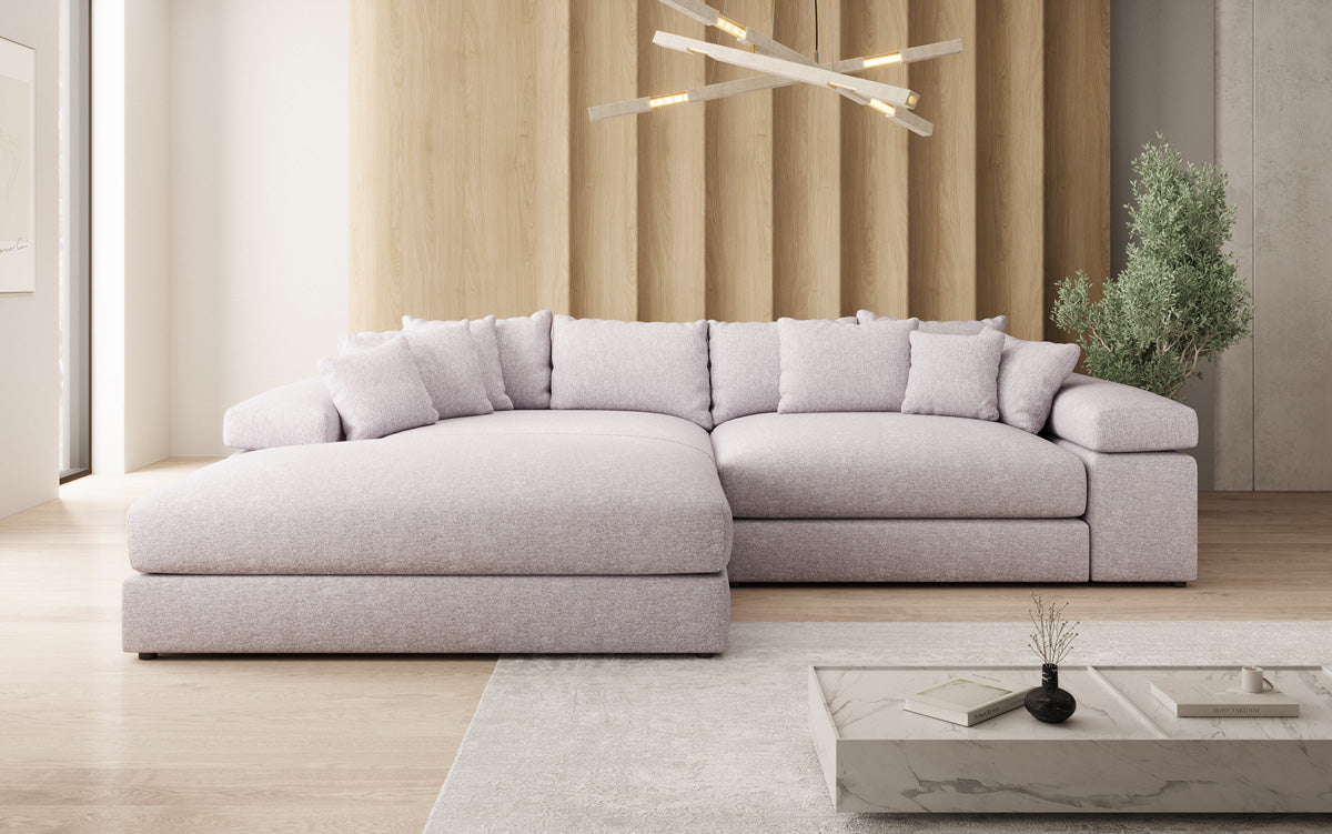 Designer-hoekbank Bernardo met brede ottomane in structuurstof