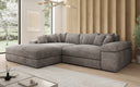 Designer-hoekbank Bernardo met brede ottomane in Ribstof