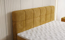 Boxspringbed Vera in Ribstof met hoge poten