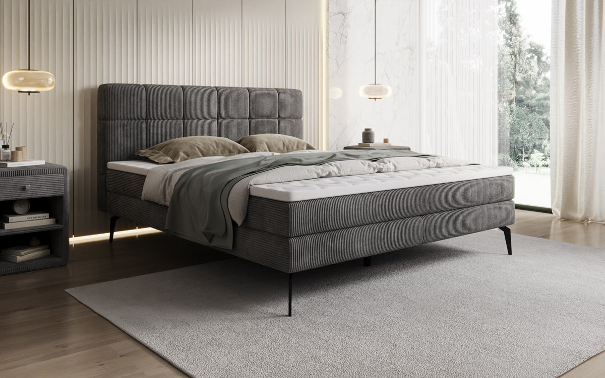 Boxspringbed Vera in Ribstof met hoge poten