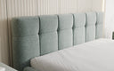 Design gestoffeerd bed Helena in structuurstof met opbergruimte