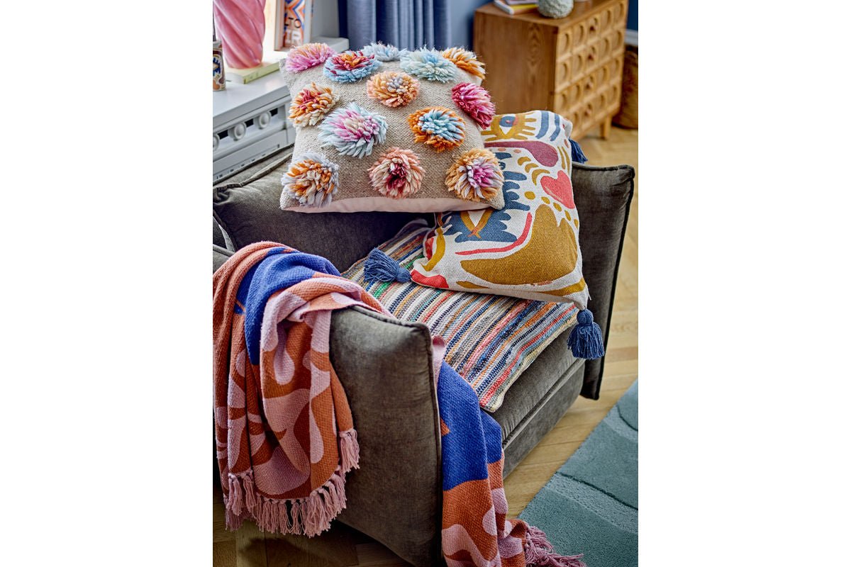 Sierkussen Florence – Getufte wollen bloemen in natuurlijke kleurenwereld