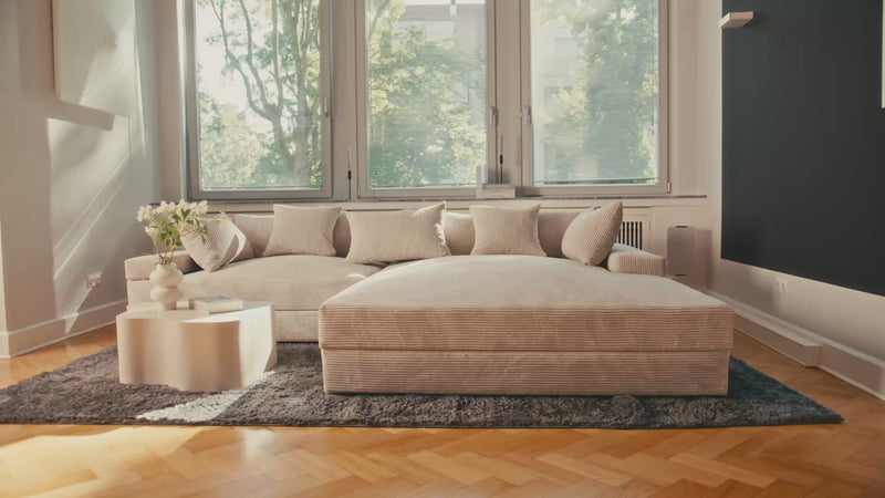 Designer-hoekbank Bernardo met brede ottomane in Ribstof