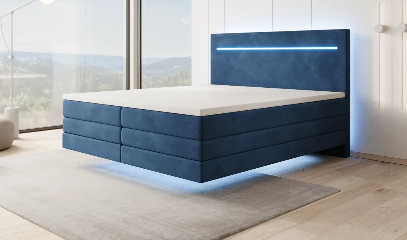 Zwevend Boxspringbed in fluweel blauw overdag